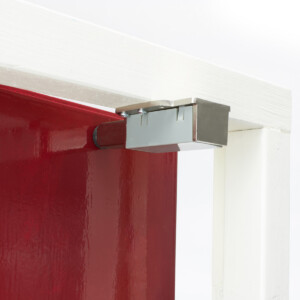 Metal door latch securing red panel top.